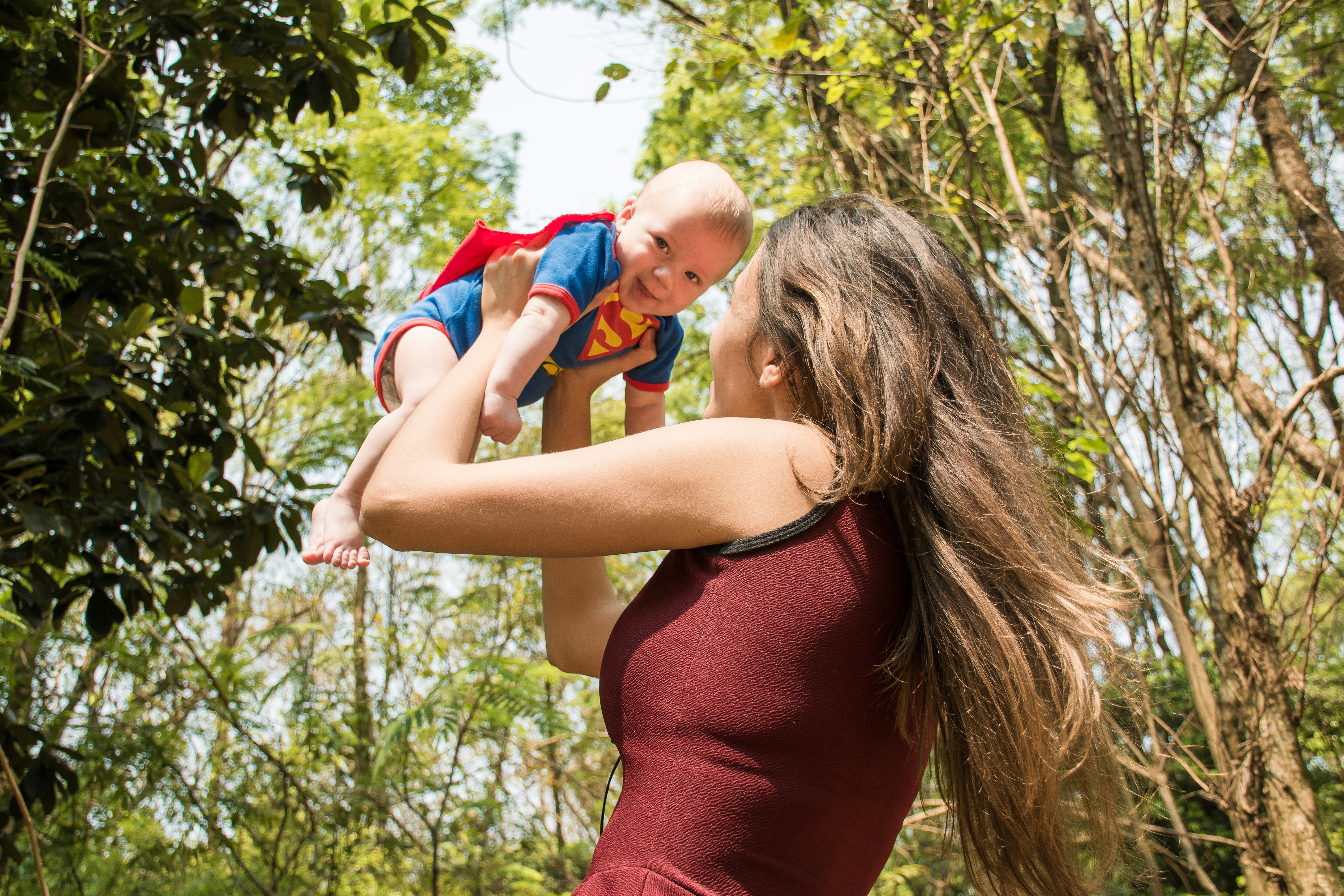 woman carrying baby